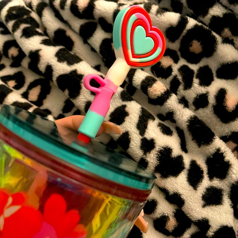 Starbucks cup with  topper